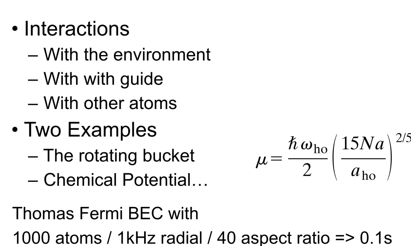 FIG. 13. Density profile for atoms interacting with repulsive forces in a spherical trap, with Na / a ho 5 100