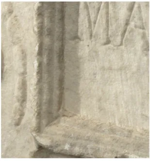 Fig. 5 - Particolare della tabula; si noti  la modanatura più interna della cornice,  probabile residuo dell’originale specchio  epigrafico ribassato