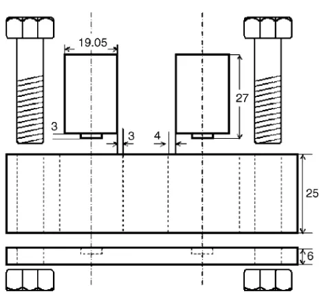 Figura 3.1 Representación esquemática del molde de acrílico y las probetas de acero AISI 1045