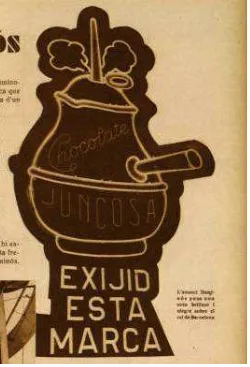 Figura 3.4. Fotografia del cartell lluminós de Chocolate Juncosa1930, pg. 21. que il·lustra l’article “Com es fa un anunci lluminós”
