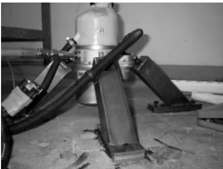 Figure 1: Servo steering pump equip with three rubber isolators mounted  upon three steel stands