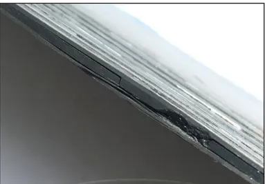 Figure 4. Delamination of (0 4 , 90 4 )s CFRP laminate after a 5 joule on-edge impact
