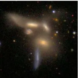 Fig. 1. Image of an extraordinary multiple interaction within a SDSS galaxy group. The host group has 27 members with M Virial = 2.12 × 10 13 M  .