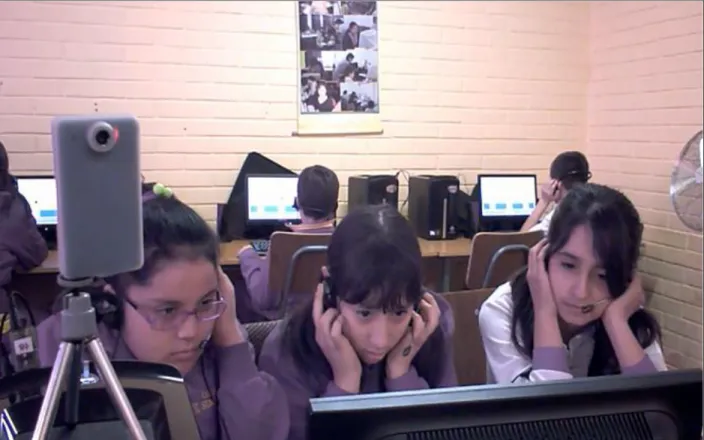 Figure II.1 In the foreground, students are using the collaborative language laboratory