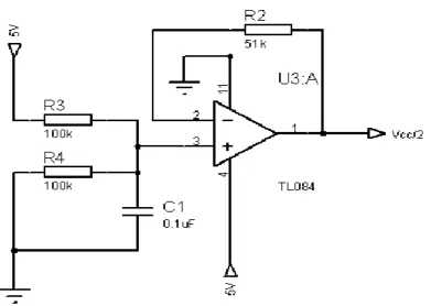 Figura 2.8 Circuito de obtención del voltaje de referencia (Vcc/2)  2.3.2.2 Sistema microcontrolador 