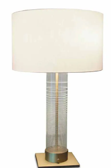 Table lamp with glass frame and  satin brass base. Silk shade with top  acrylic diffuser