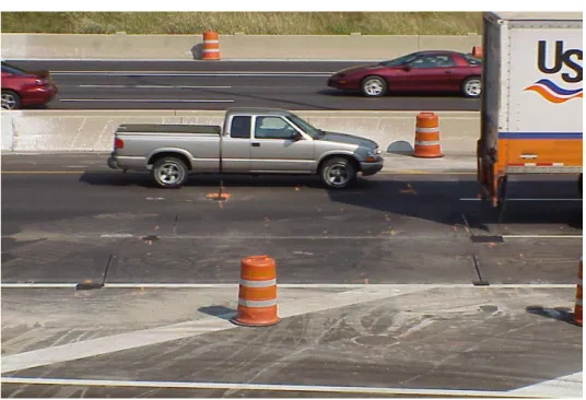 FIGURE 4.3. Pavement-embedded detectors, saw cuts and pull box visible. 