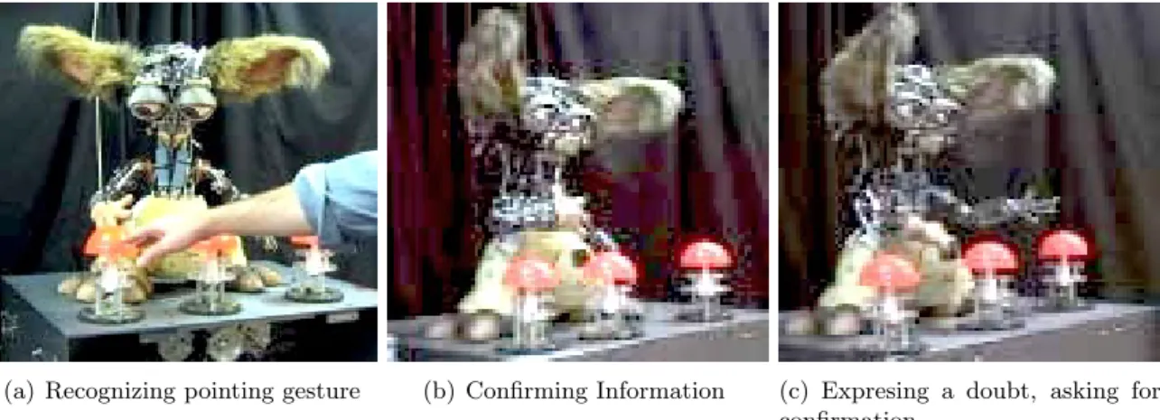 Figure 2.10: Leonardo [Brooks 04], performing a gaze and pointing while learning games from a human teacher.
