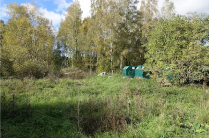 Figure 6: Old dump next to recycling station. 