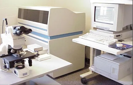 Figure 1.2: BD FocalPoint™ GS Imaging System, along with GSW microscope workstation and PC interface and printer   