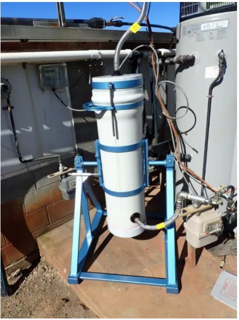 Figure 5. The experimental biogas chemisorption treatment column installed at the 