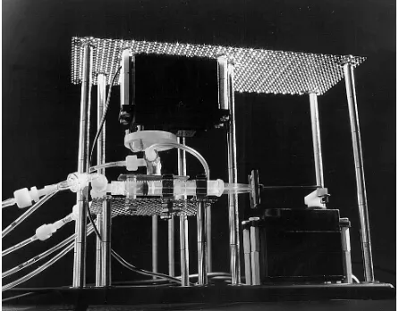 Figure 9: Interfacing the artiﬁcial enzymatic neuronwith a conventional architecture. Servos from radiocontrolled models can be operated through pulse-width modulation by a digital computer