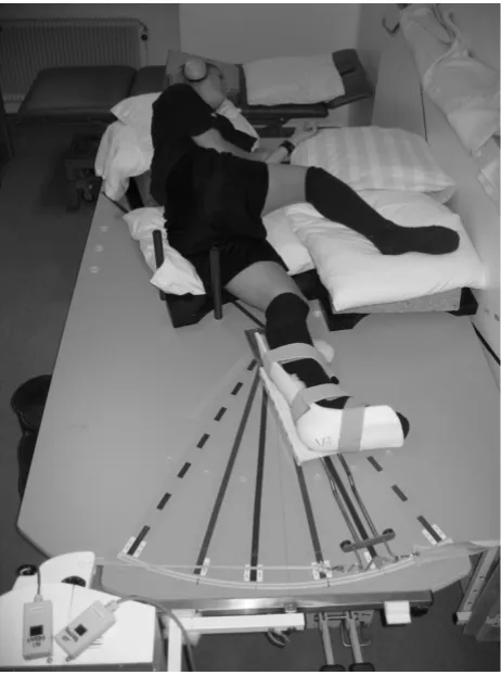 Figure 1specially design platformKnee kinesthesia tested in a lateral decubitus position on a Knee kinesthesia tested in a lateral decubitus posi-tion on a specially designed platform