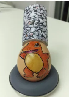 Figure 4: A a printed marker was  rolled up and placed inside the cup. This simple approach works as long as the walls of the cup are cylindrically in shape