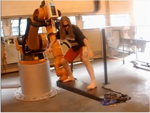 Figure 3. Programmer surfing a KUKA robot. 