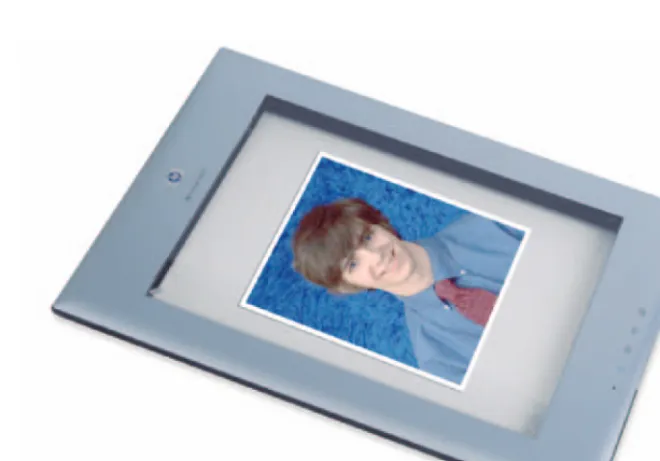 Figure 1-3: This scanner’s novel design lets you view the photo through the glass while it isbeing scanned.