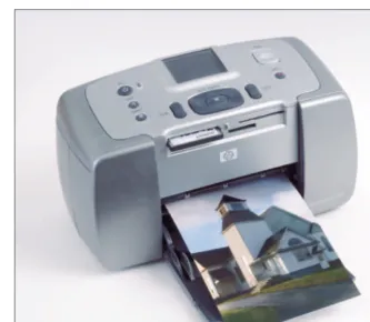 Figure 1-4: Plug a memory card into the slot on this printer, choose an image on the built-inLCD, and you can make a print without using a computer.