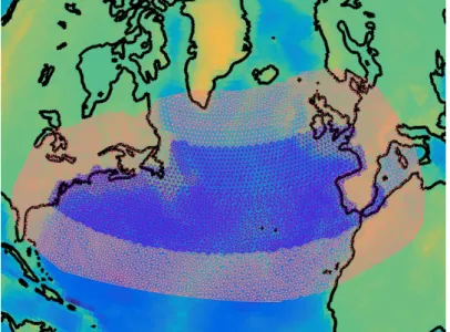 Figure 4.2: Mesh of the north Atlantic ocean considered in Paper IV. Region of interest (blue triangles) and extension region (pink triangles).