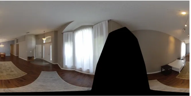 Figure 3.8: Example of an equirectangular image from one of the transition videos. Note the masked out black region removes the cameraperson from view.