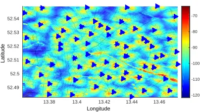 Fig. 2. Link context example: a pathloss map of Berlin downtown obtainedfrom the data of the MOMENTUM project [39], where the triangles representbase stations