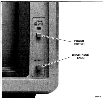 Figure 1-2 shows the front of unit: the brightness control and the power switch. Figure the Display/CPU unit