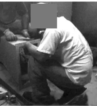 Figure 18.  Duct Worker Removing Flange