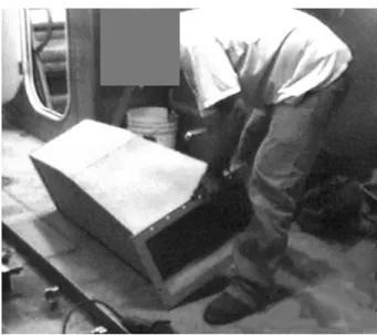 Figure 21.  Duct Worker Moving Piece of Ductwork