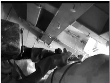 Figure 22.  Welder Stick Welding Overhead