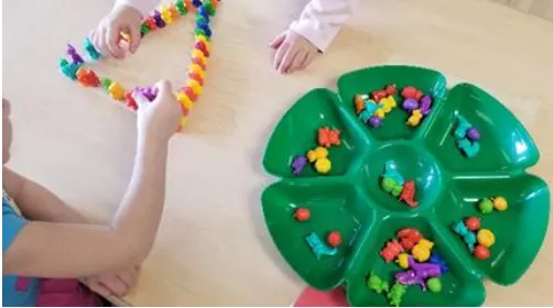 Figure 7. Making patterns on shapes with colored animals.  