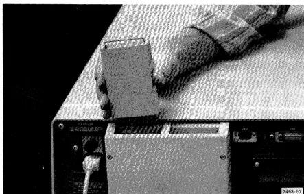 Figure 3-17. Plugging in the ROM pack. 