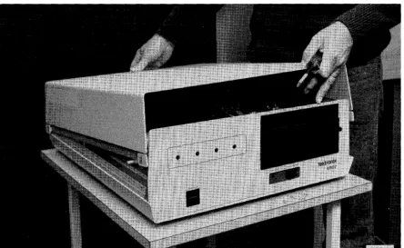 Figure 5-1. Removing main 4907 cabinet cover. 