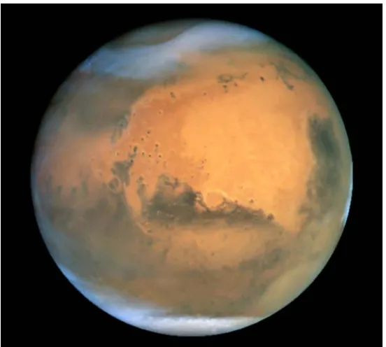 Figure 1.2. View of Mars from Hubble Space Telescope on June 26, 2001. The colors have been carefully balanced to give a realistic view of Mars' hues as they might appear through a telescope [Source: NASA Image PIA03154; Image Credit: NASA and The Hubble H