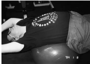 Fig 3. This is an extension exercise performed on a physioball to help increase flexibility in the spine.
