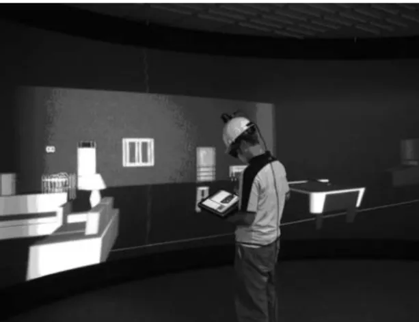 Figure 1.  A student works on an apartment model  using the system.