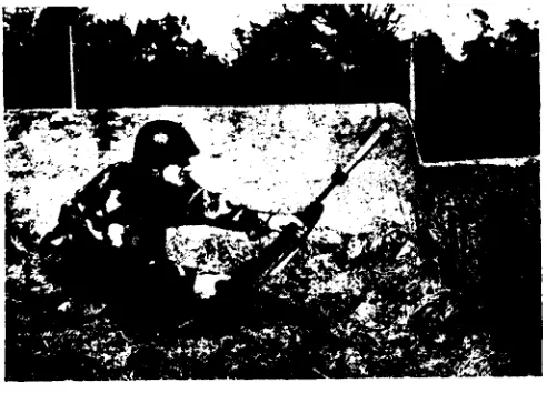 Fig. 15-Dig the heel of the butt into the earth, withthe pistol grip uppermost, i.e. towards the firer.