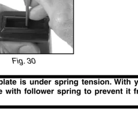 Fig. 33Pushing buttstock into upper and lower receiver