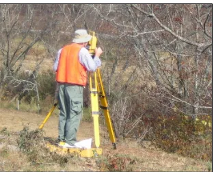 Figure 2-1.  Using a total station to survey a stream. 