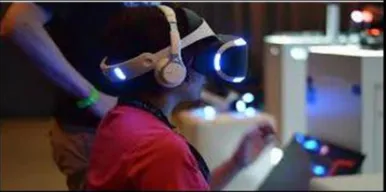 Fig - 1: Use of virtual reality technology (HMD) for gaming purpose [1]  