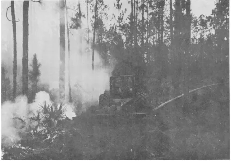 Figure 10-11.  Fire-line construction using heavy fire-line plow.