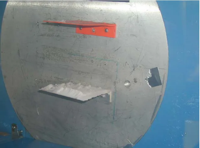 Figure 3-11:  Vortex generator after being in the icing wind tunnel for  approximately 20 minutes at -2°C; the coated surface (orange) exhibited 