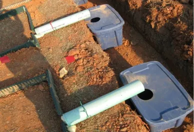 Figure 3.  Plastic was placed over each tub to insure that no direct precipitation entered and diluted the sample
