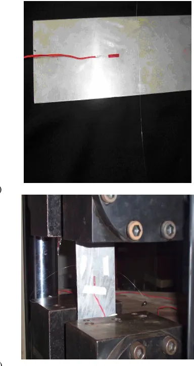 Fig. 6: Load vs. Strain of steel strap 1, fiber optic in  compression  