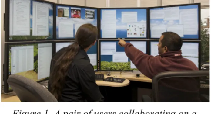 Figure 1. A pair of users collaborating on a  large, high-resolution display.  