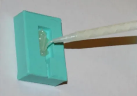 Fig. A-1. 13. Filling the base layer of epoxy in mold 