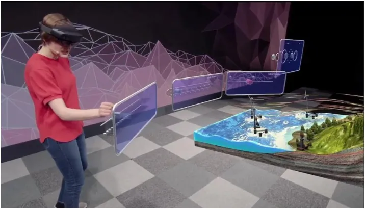 Figure 2. An image from Microsoft’s HoloLens 2 live demonstration. The user is interacting with virtual objects viewed from the created holograms within the HoloLens headset
