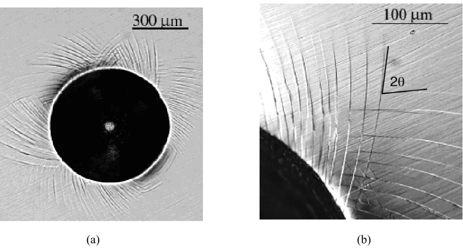 Fig. 5(a) Area around an indent formed at higher loads. (b) An optical micrograph of a Vickers indentation