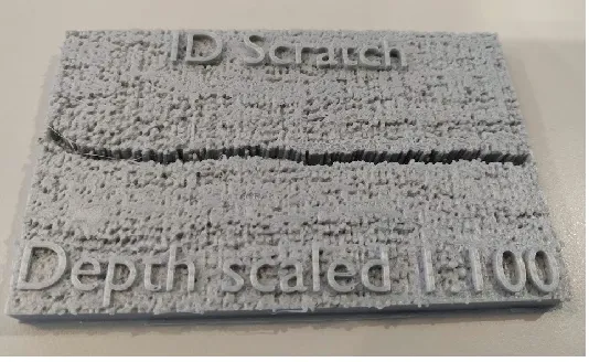 Figure 3. A 3D printed model, with scaled depth of 1:100, of a pressure tube flaw 