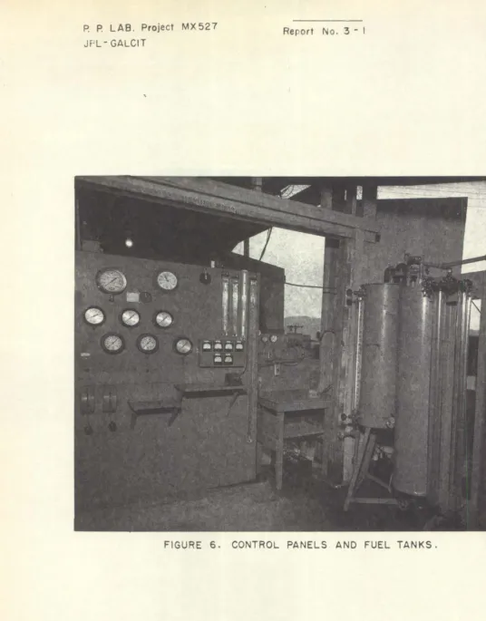 FIGURE 6. CONTROL PANELS AND FUEL TANKS. 