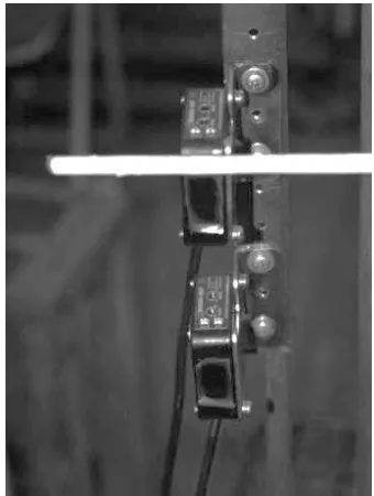 Fig. 5. Speed sensor consists of two diode sensor and a bar fixed  to the impactor  