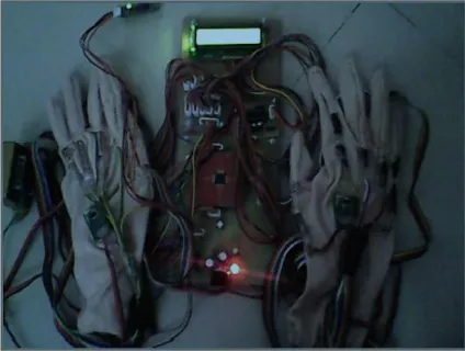 Figure 3 shows the implemented gesture recognition system. In this system, ten resistance sensor and two ADXL335 accelerometer sensors are used to measure bend signal of finger and position of hand respectively